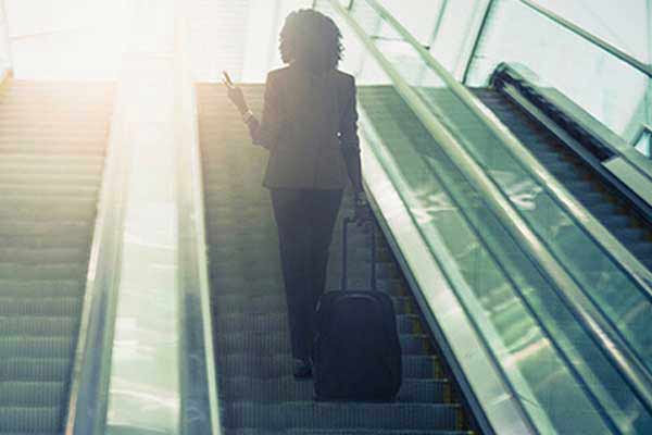 lady on escalator