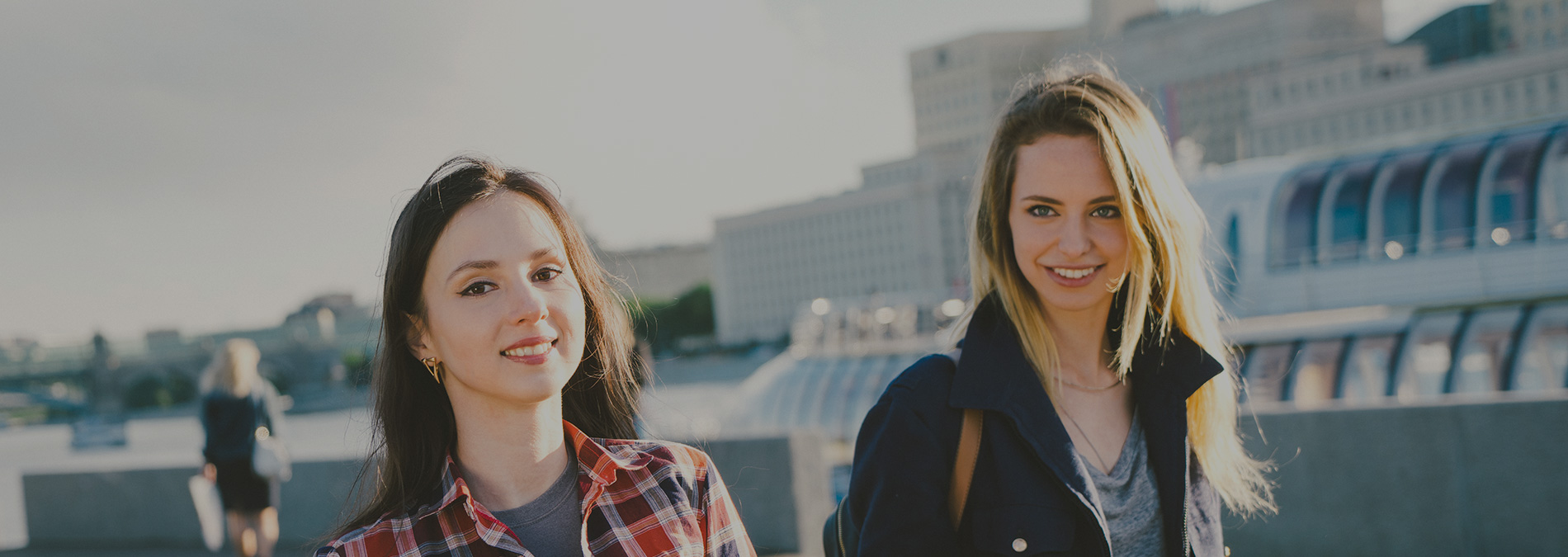 two young women with bikes